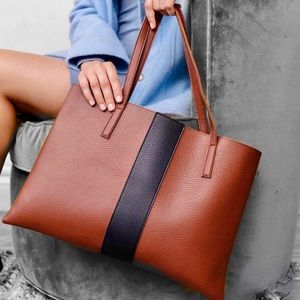Vince Camuto Luck Tote in Cognac with Black Racer Strip in Pebbled Vegan Leather